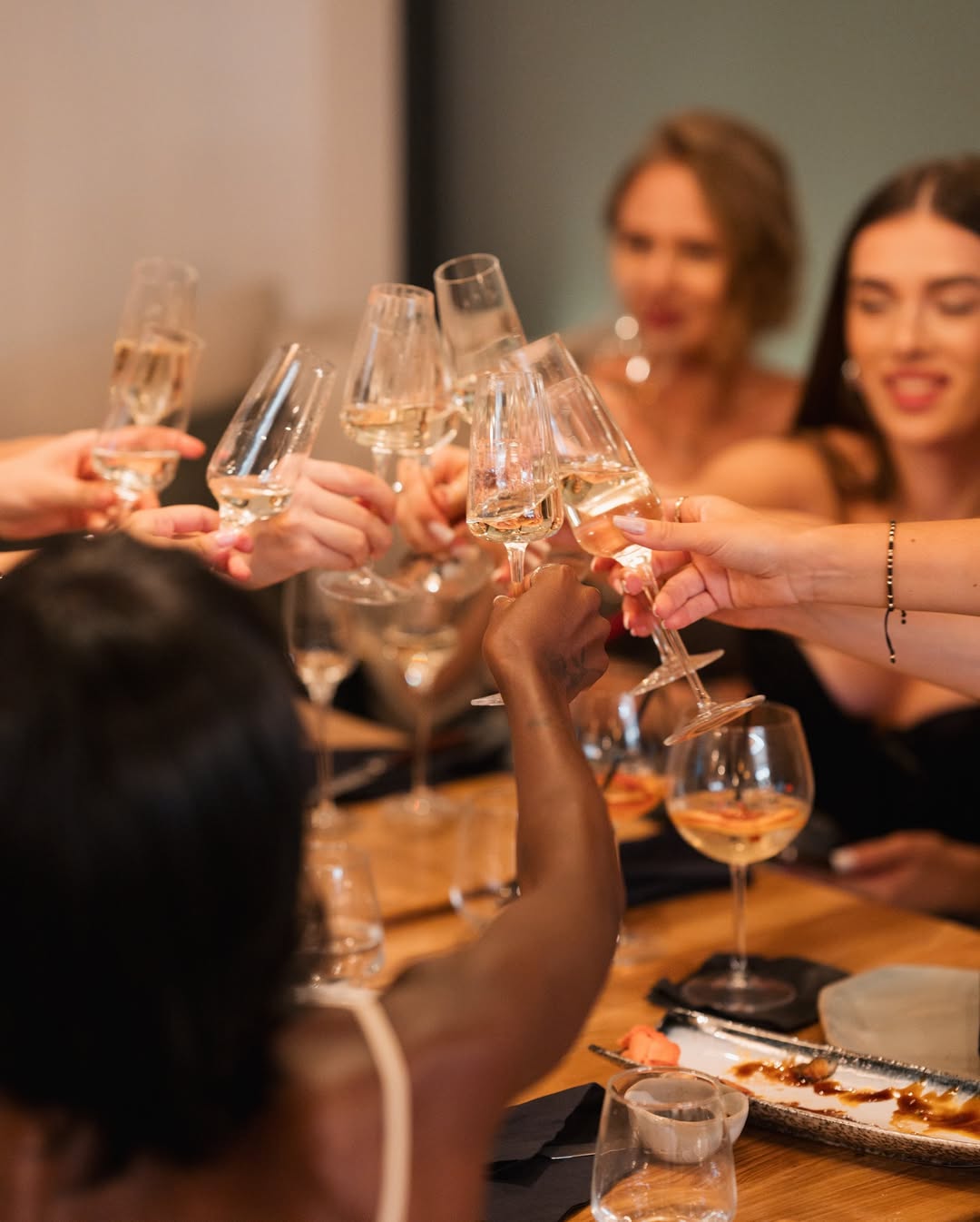 Friends toasting with champagne glasses
