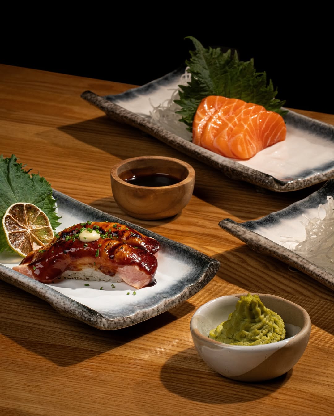 Salmon sashimi and glazed nigiri